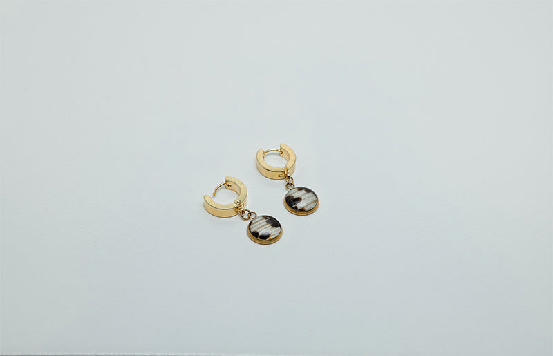 Golden Huggies on a white background.