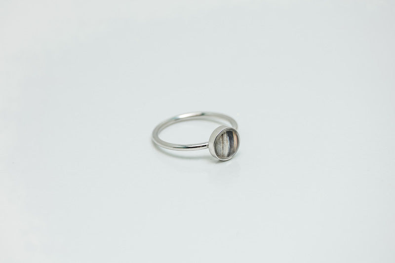 A Mini Silver Ring on a white background.