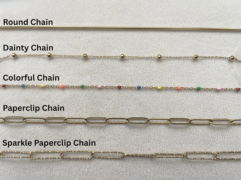 Chain options showing round, dainty, colorful, paperclip and sparkle paperclip on a cream background.